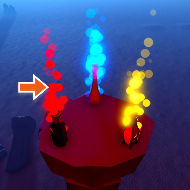 Three particle emitters emit red, blue, and yellow particles over jar assets that sit on top of a stone tower. The red particles are highlighted.