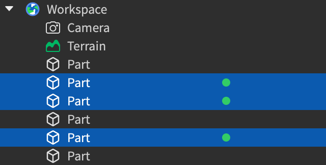 A close up view of the three block part objects in the Explorer window. There is a green circle near the objects to signify that the collaborator with the green color has the parts selected in their Studio instance.